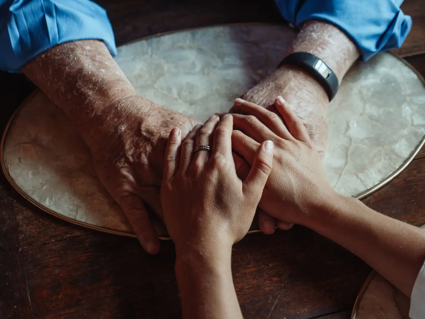 Hands resting together